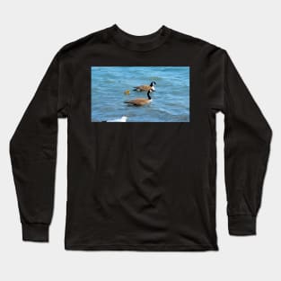 Two Canada Geese Parents Swimming With Their Gosling Long Sleeve T-Shirt